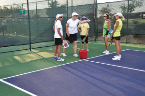 Mentor Linda Richter, second from left, prepares her group for serving practice drills. Left to right: Gretchen Malaski, Linda Richter, Consuelo Melhuish, Melanie Ritson and Michelle LeBere. undefined