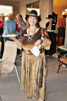 Pam Sarlund in her hat and fringed skirt. undefined