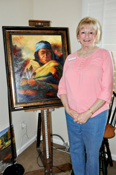 Lorretta Johnson and her oil painting undefined
