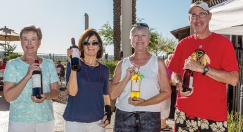 Marlene Jolly, Lynn Fidler,  Deb Lawson and Jim  Carstens who won bottles of wine.