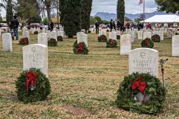 Wreaths at the graves in the cemetery
