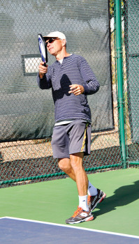 Scott serving during a private lesson