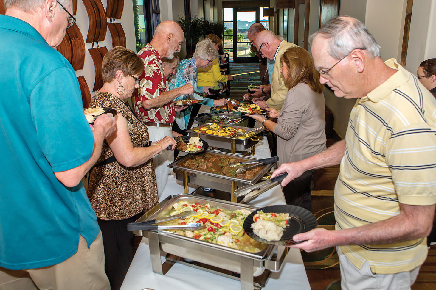 Attendees enjoy a delicious meal.