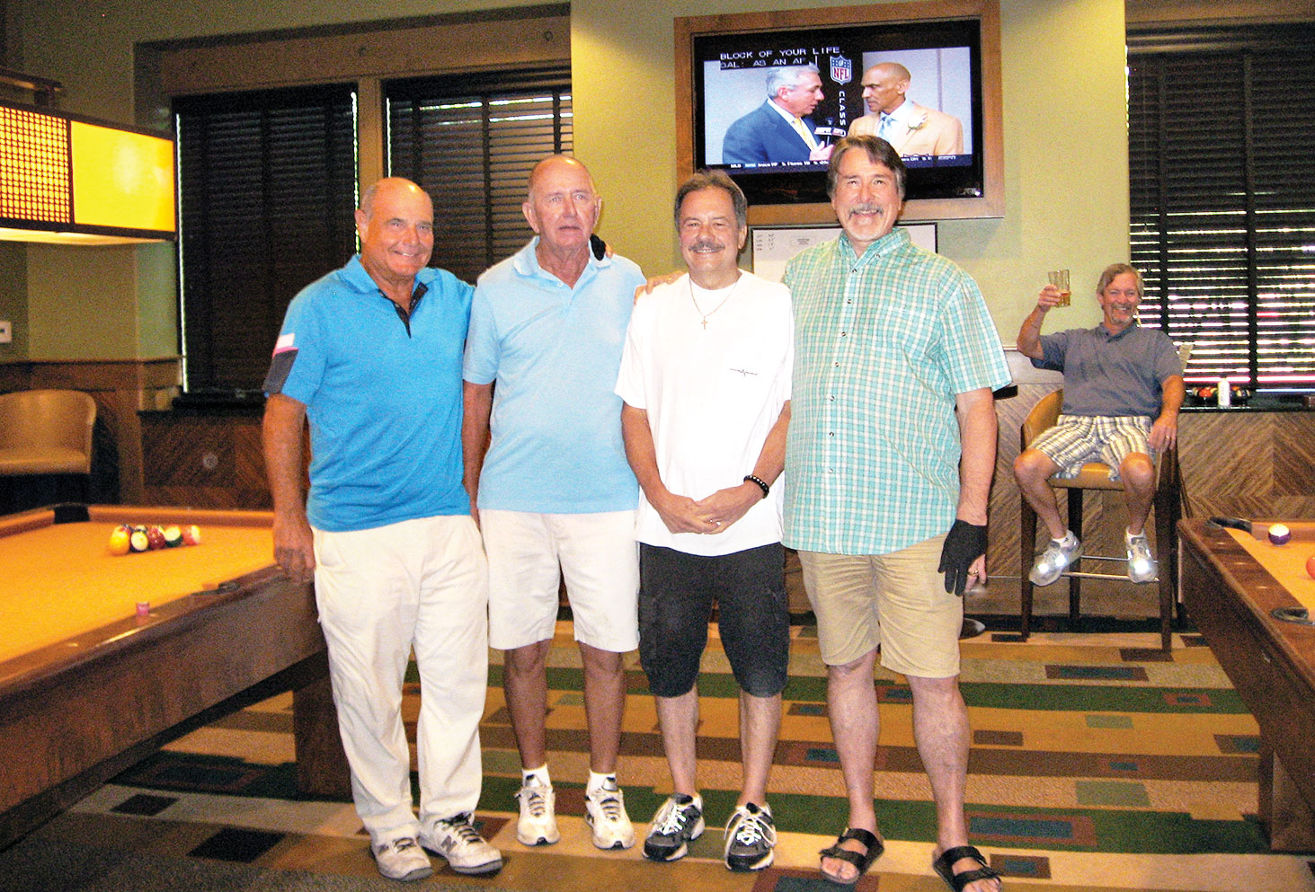 Left to right: Bruce Fink, second place; Larry Tipton, fourth place; Paul “Bankster” Callas, first place; Tom “Half Jacket” Barrett, third place. Lurking in the background is Dominic “The Doctor” Borland sitting in his very familiar chair.