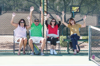 Cheering for a match, left to right: Cathy Johnson, Mark Johnson, Jackie Levitt and Raeone Gilison