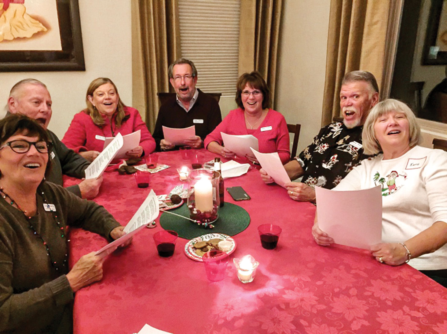 Just a few of the many singing that night, left to right: Linda Sherfy, Dick Ryan, Betty Ryan, Steve Chapman, Debbie Chapman, Frank Sherfy and Kate Thomsen around one of the tables; picture courtesy of Steve Weiss
