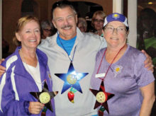 Cook Off winners, left to right: Teresa Burchfield, third place; Kosmo Kramer, first place; Susan Engebretson, second place
