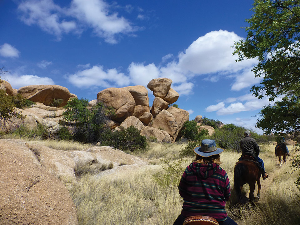 Bob Johnson and Alyce Grover follow the guide past some truly amazing rock formations.