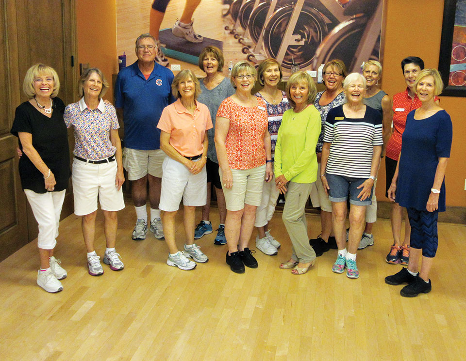 Level 2 line dance class takes a photo break in the Hacienda aerobics room. They just perfected ‘Smoky Places,’ their newest dance-a rumba. ‘Cowboy Rhythm’ will follow this break and pump up their heart rates.