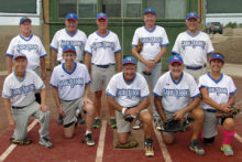 The Charles Company team, with manager Ron Quarantino, dominated Monday softball. Photo by Pat Tiefenbach