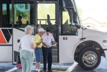 Motor coaches provide transportation from parking at MountainView to the fair at SaddleBrooke One.