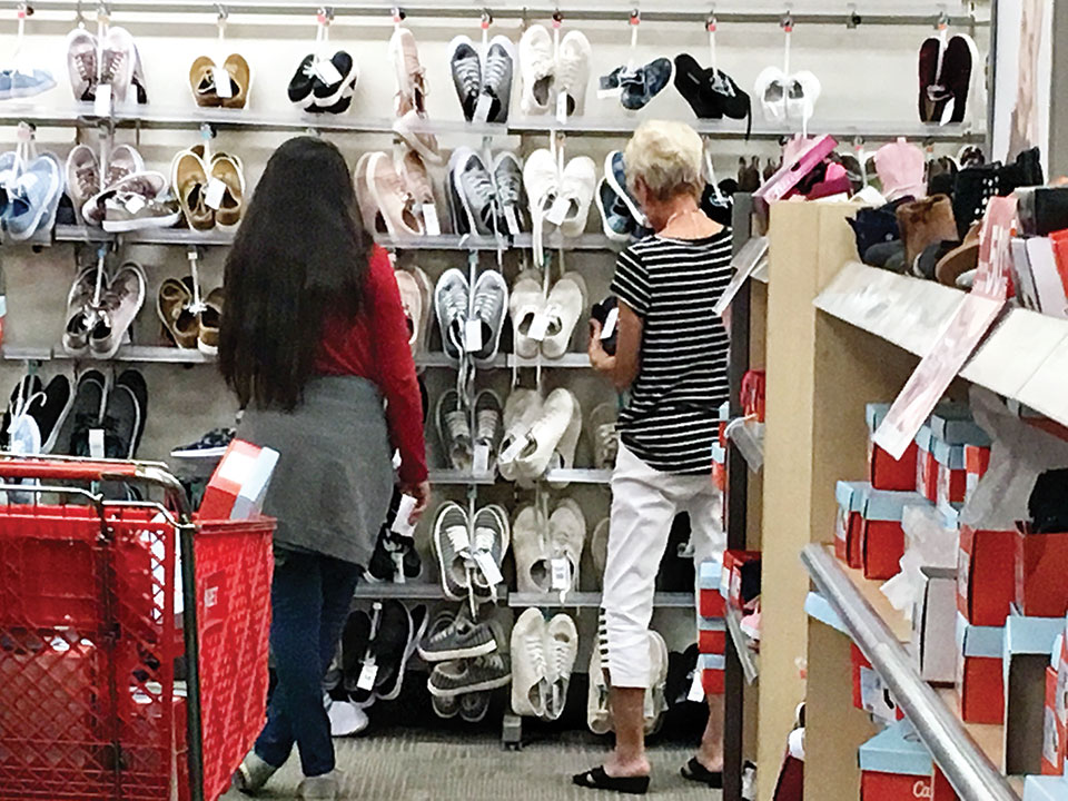 A Teen Closet shopper and SaddleBrooke Ranch resident, Corine Sturdivant, review the shoe selection at Target.