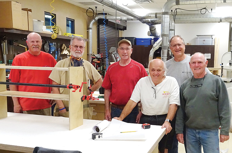 Members of the SBR Woodworkers Club assemble bookcases for the book shelf reading program sponsored by SaddleBrooke Community Outreach (SBCO). From left to right: Ron Gustafson, John Gordon, Ed Cheszek, Jeff Hansen, Dan Carter, Barry Milner; Photo by Steve Groth.
