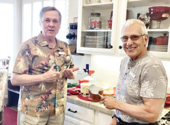 Bob Authur and Jim Spiegel scoop up favorite Blue Bell flavors at the Texas Club “Bluebonnets and Blue Bell” event.