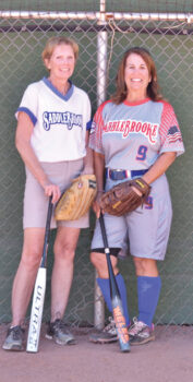 Mary Schneck (left) and Janice Mihora play senior softball for the fun, competition, exercise, and camaraderie.