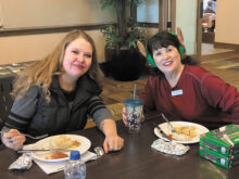 Allison Honeycutt, from Golf Cars of Arizona, enjoys brunch with Linda Santevanac, Vice President of the Ranchette Putters.