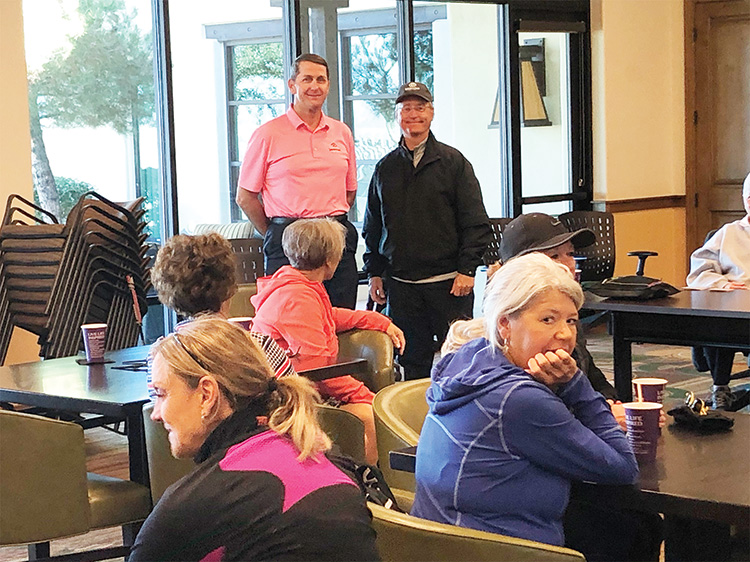 SBR golf pros, Ken Steinke and Mike Jahaske, share tips and encouragement with the Ranchette Putters; Photo by Camille Esterman.