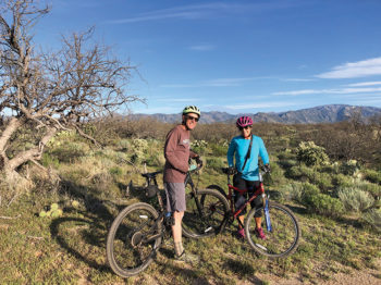 Steve Hanns and Jennifer Black ride their bicycles regularly in the desert.