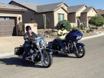 Leslie and Les Brown enjoy the open road on their motorcycles.