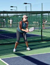 Our Director of Events, Beth Chamberlin, was taking her match on court 1 very seriously!