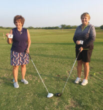 State Medallion winners Lee Rinke (low net) and Jean Cheszek (low gross) with their new State Medallion ball markers.