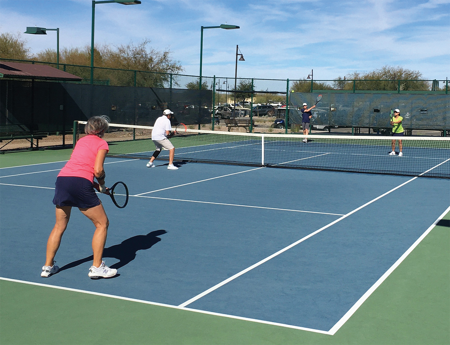 Mixed doubles on Court 3 sees Sue Cook and Chip Kerth (nearside) take on Anita and Terry Zimmerman on another gorgeous February morning at SaddleBrooke Ranch.