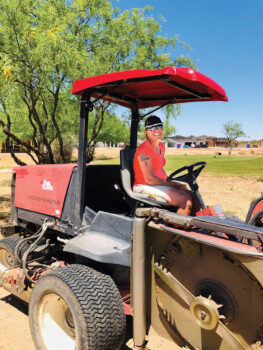 Crystal Gilbert and the SaddleBrooke Ranch maintenance crew are working with Oliphant, Inc. to install the new greens, while still maintaining the current grounds and landscaping. Construction of new homes continues in the background.