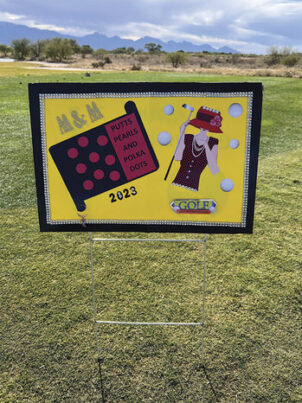 The Putts, Pearls, and Polka Dots event sign